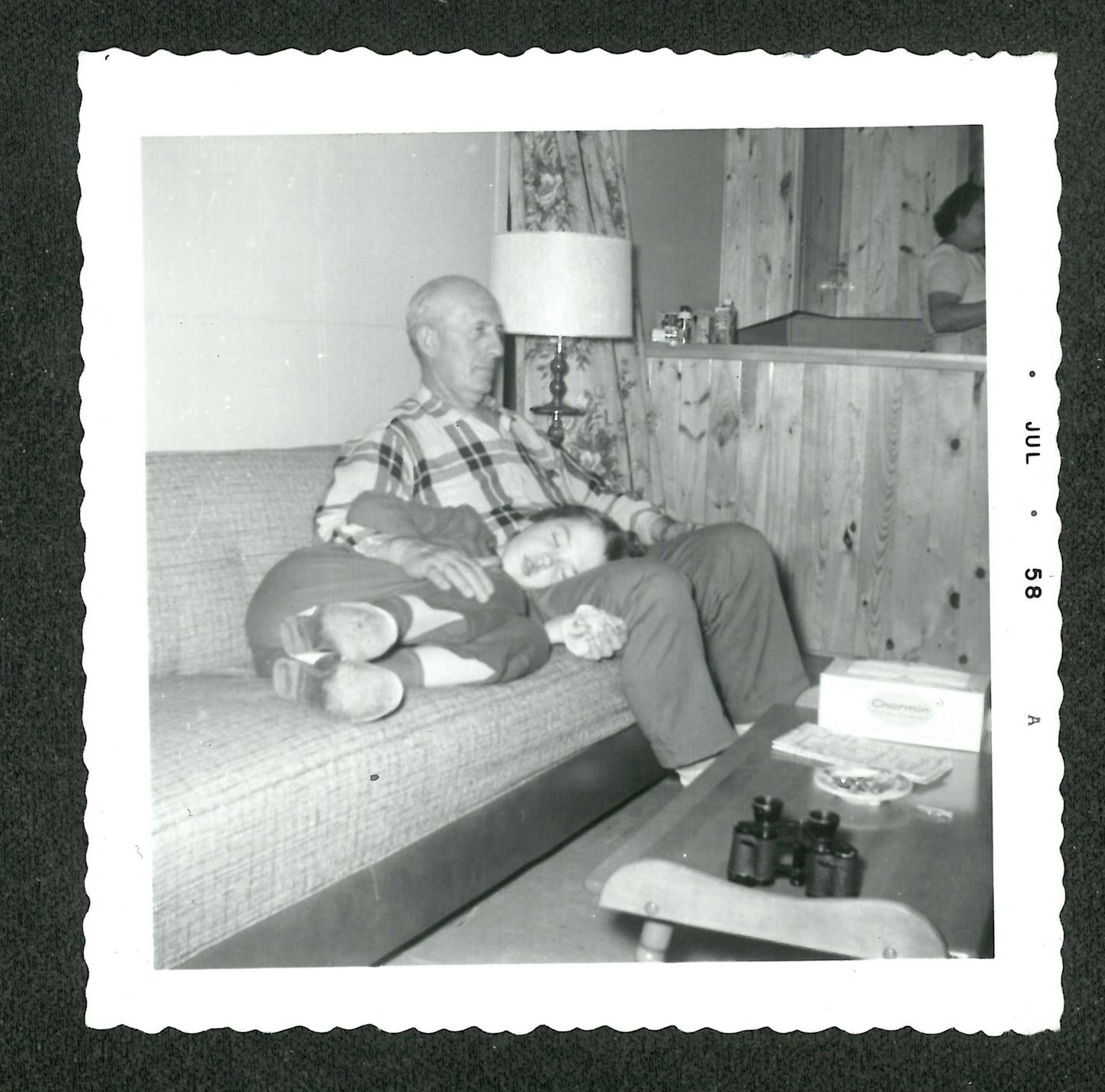 Janet Lee Dahl resting with her father after a "spell."
1958 A discarded photo album discovered in a southern California flea market reveals the short life of a Minneapolis girl in the 1950s, and her mother's determination to document it.