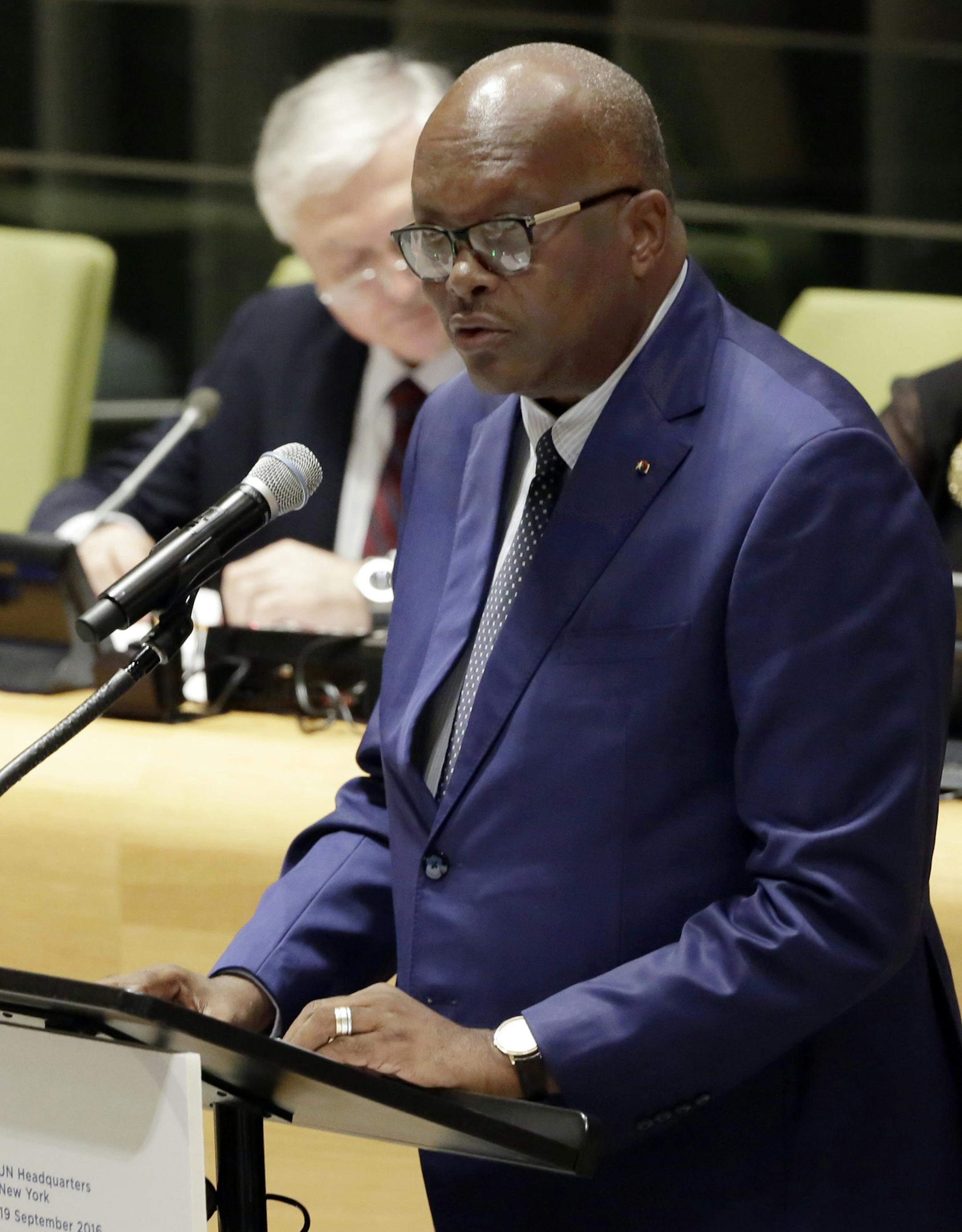 Burkina Faso's President Roch Marc Christian Kabore addresses the United Nations Summit for Refugees and Migrants, in the Trusteeship Council Chamber of the United Nations, Monday, Sept. 19, 2016. (AP Photo/Richard Drew) ORG XMIT: UNRD119