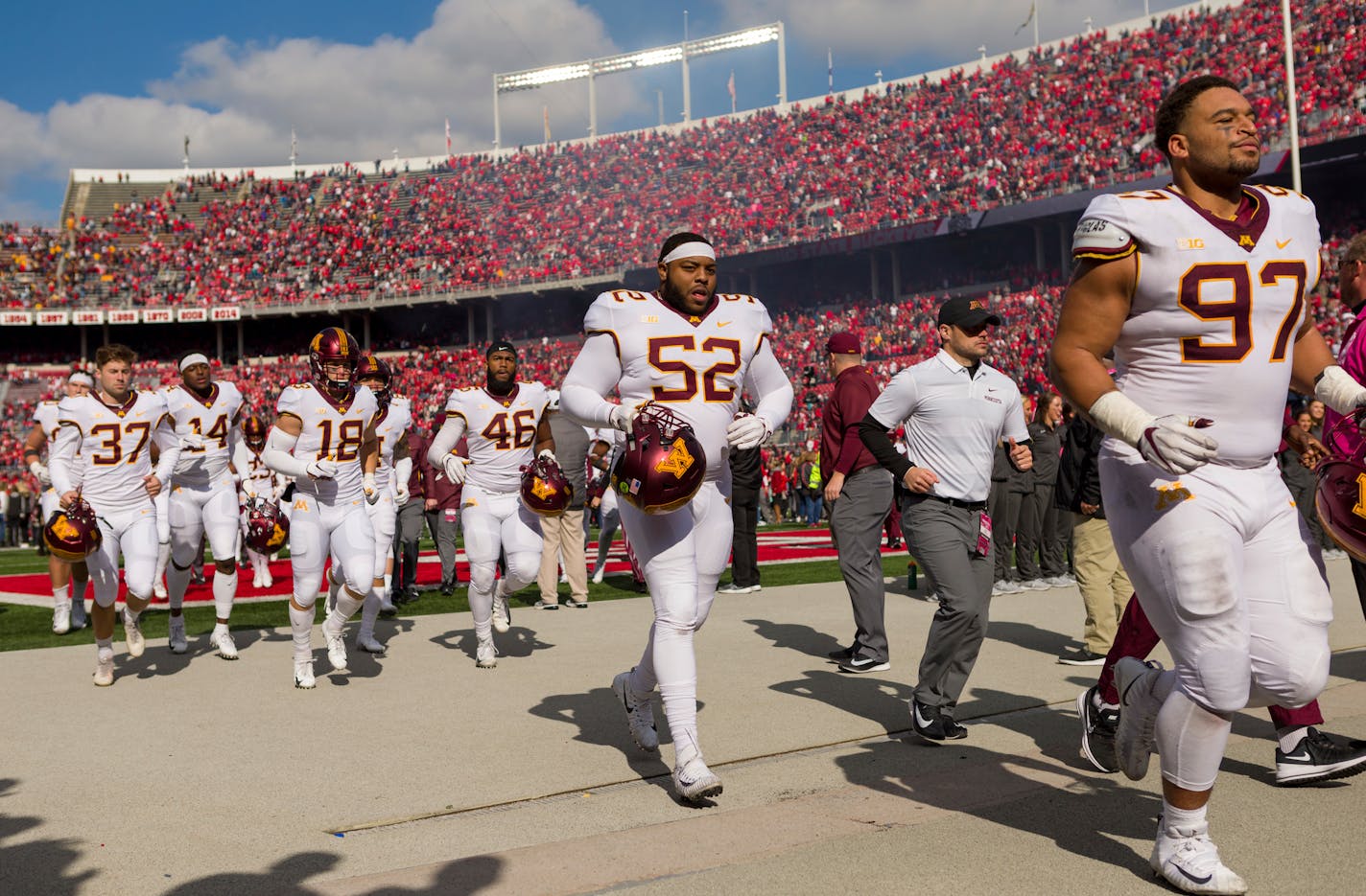 COLUMBUS, OH - OCTOBER 13: Minnesota Golden Gophers defensive lineman Jamaal Teague (52) and teammates jog off the field after losing a game between the Ohio State Buckeyes and the Minnesota Golden Gophers on October 13, 2018 at Ohio Stadium in Columbus, OH. The Buckeyes won 30-14. (Photo by Adam Lacy/Icon Sportswire) (Icon Sportswire via AP Images) ORG XMIT: 311954