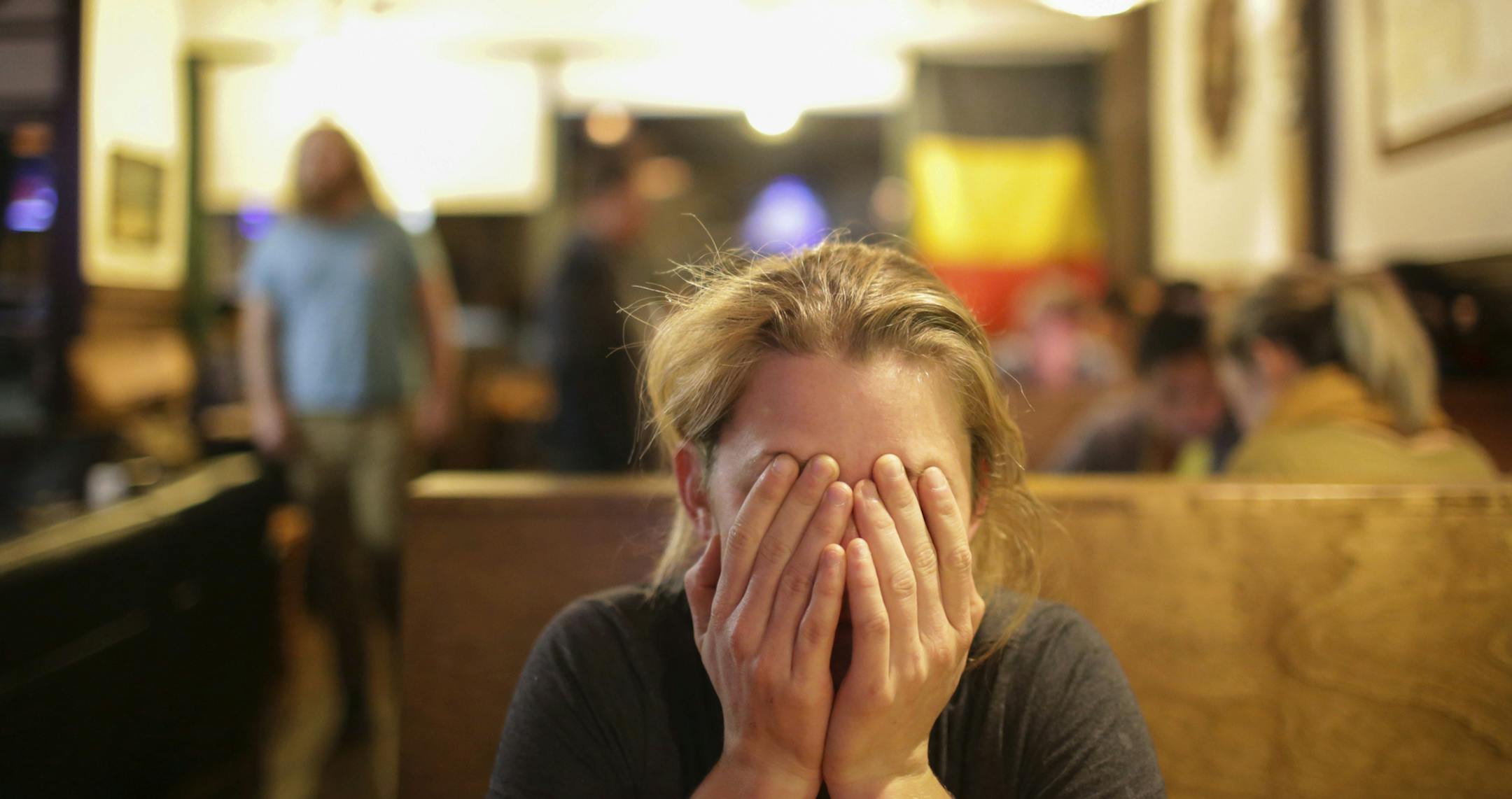 Gillian Hilbert reacts as numbers indicating Republican presidential candidate Donald Trump may win the 2016 Presidential election, Wednesday, Nov. 9, 2016. Trump went on to win the 2016 Presidential election. (John Roark/Athens Banner-Herald via AP) ORG XMIT: MIN2016110915023371