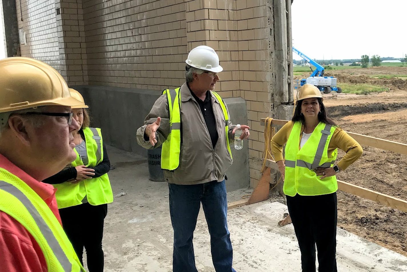 MPCA Commissioner Laura Bishop (right) visited the under-construction Premium Minnesota Pork plant in Luvurne in 2019. PHOTO: MPCA