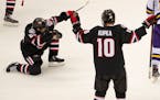 St. Cloud State forward Nolan Walker (20) celebrated after scoring the game winning goal with under a minute to play in regulation.