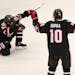 St. Cloud State forward Nolan Walker (20) celebrated after scoring the game winning goal with under a minute to play in regulation.