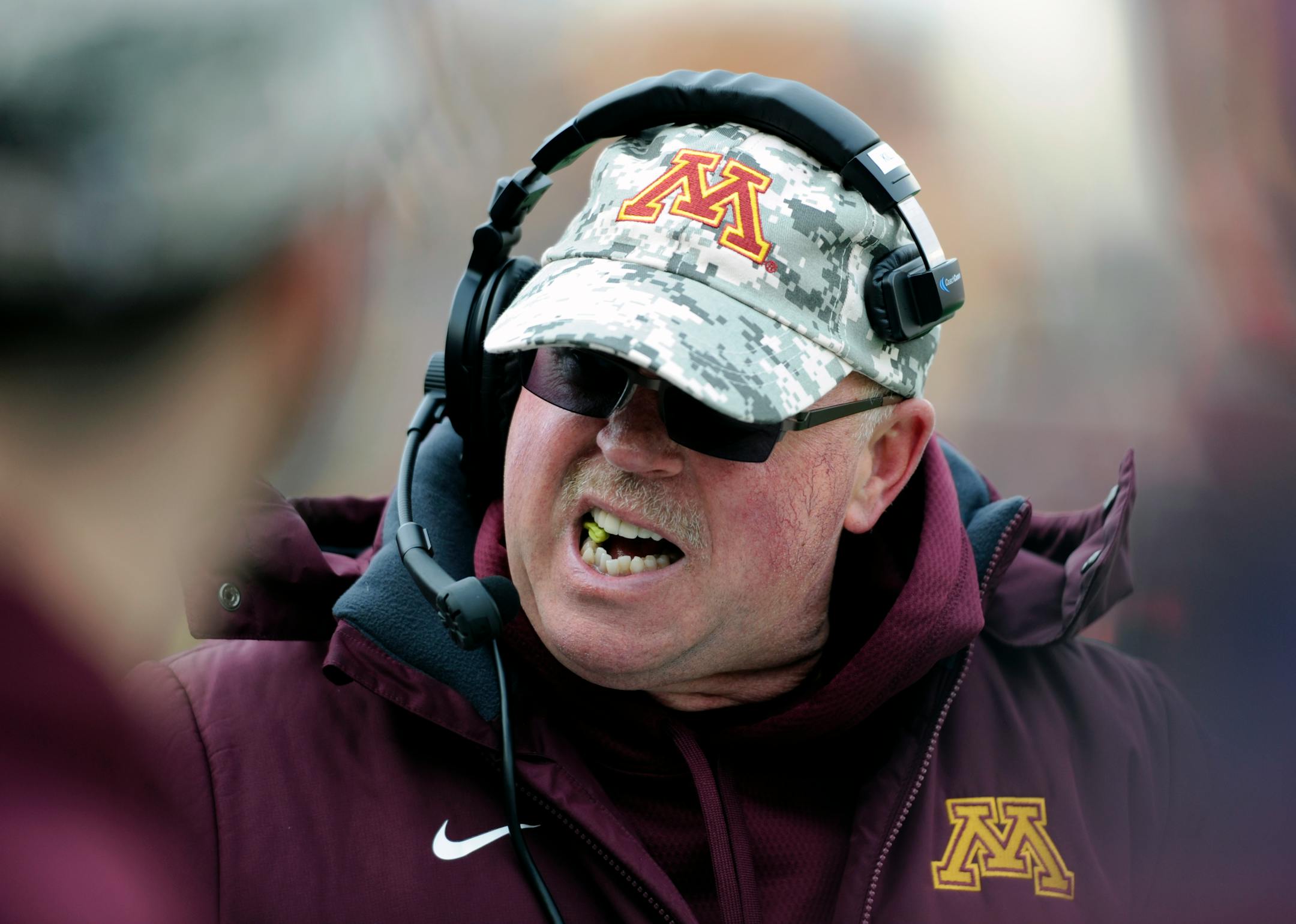 Minnesota head coach Jerry Kill watches from the sideline during the fourth quarter of an NCAA college football game against Iowa on Saturday, Nov. 8, 2014, in Minneapolis. Minnesota won 51-14. (AP Photo/Hannah Foslien)