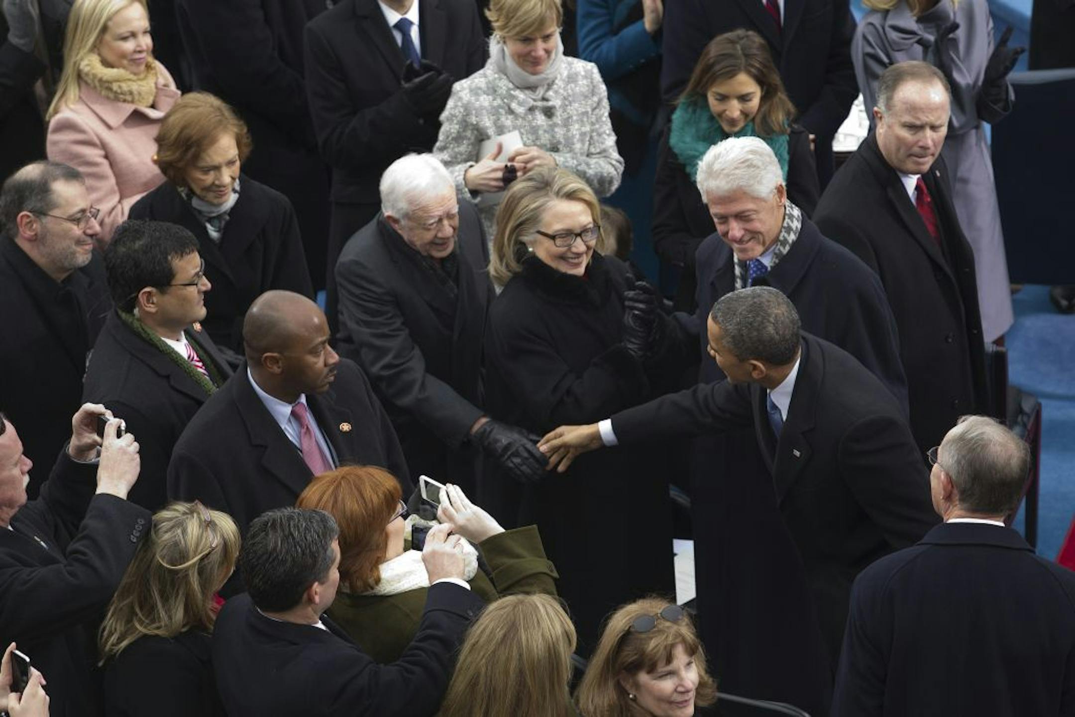 President Obama greeted the only other living Democrats who have occupied the White House, Jimmy Carter and Bill Clinton. His inauguration also marks an end of a chapter for Hillary Rodham Clinton, who will step down as secretary of state.