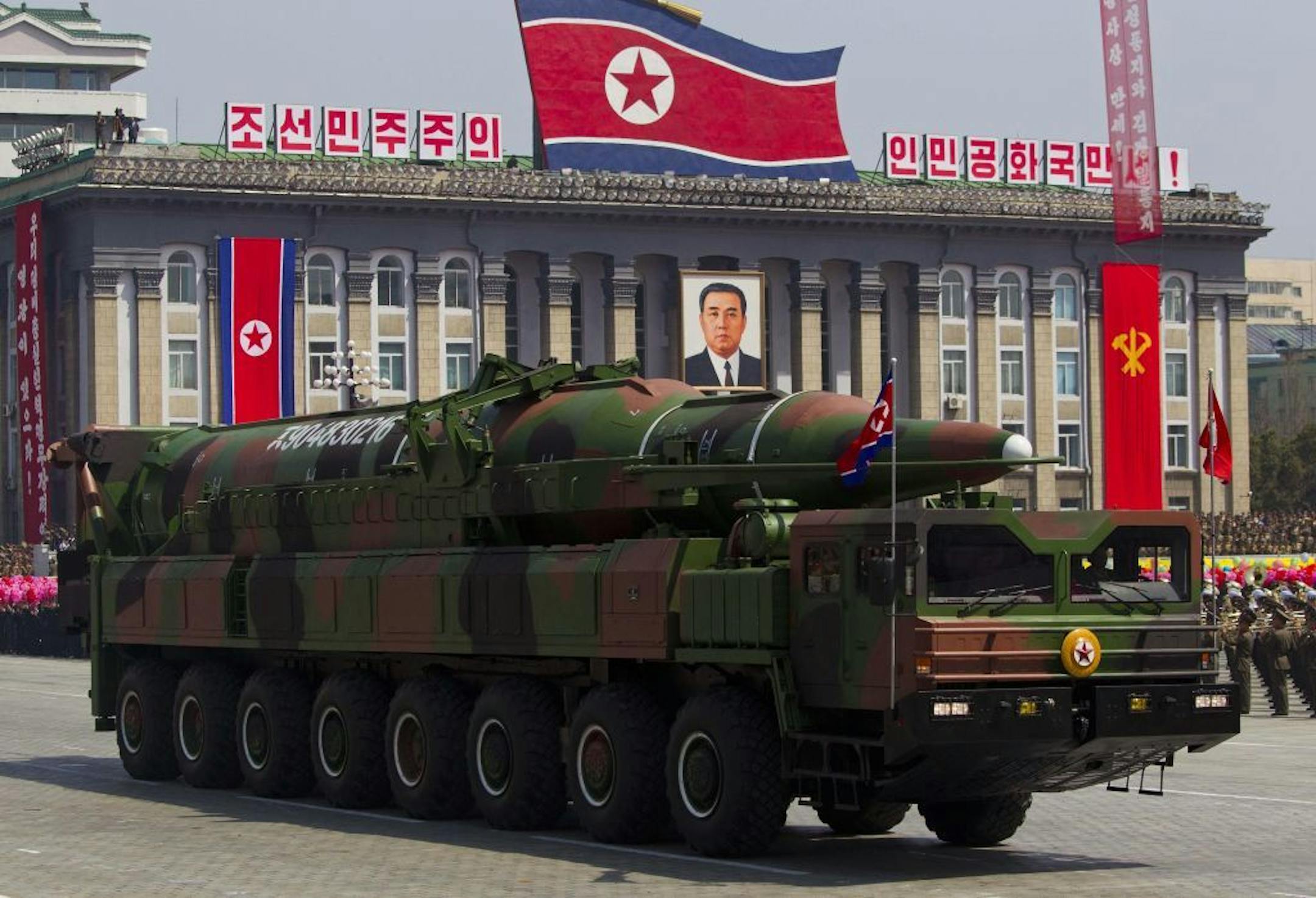 FILE - In this Sunday, April 15, 2012 file photo, a North Korean vehicle carrying a missile passes by during a mass military parade in Pyongyang's Kim Il Sung Square to celebrate the centenary of the birth of the late North Korean founder Kim Il Sung. North Korea has moved a missile with "considerable range" to its east coast, South Korean Defense Minister Kim Kwan-jin said Thursday, April 4, 2013.