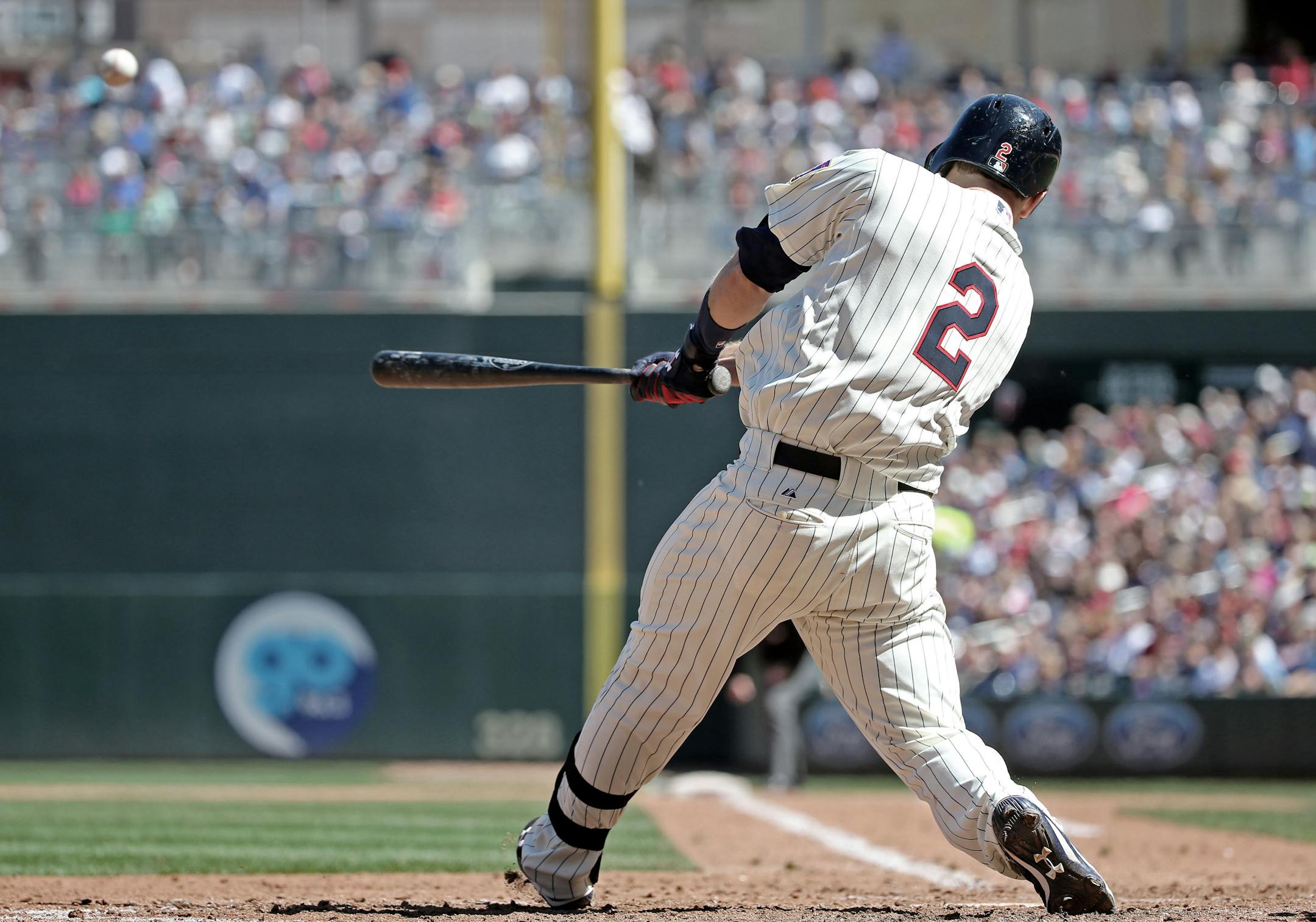 Brian Dozier strokes the winning hit, a seventh inning triple to score Aaron Hicks during the Twins 3-2 win over the Toronto Blue Jays Saturday, May 30, 2015, at Target Field.