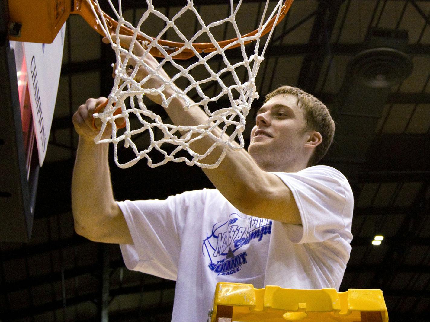 South Dakota State&#x2019;s Nate Wolters cut the net after winning the Summit League title game in March. He's now with the Milwaukee Bucks.
