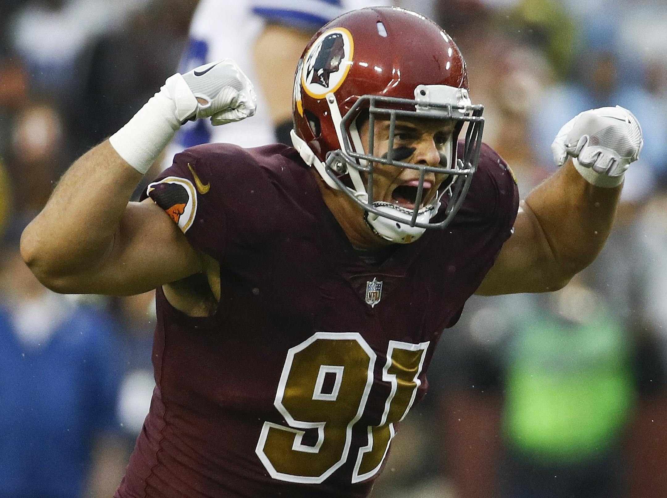 Washington Redskins outside linebacker Ryan Kerrigan (91) celebrates his sack of Dallas Cowboys quarterback Dak Prescott during the first half of an NFL football game in Landover, Md., Sunday, Oct. 29, 2017. (AP Photo/Patrick Semansky) ORG XMIT: NYOTK037