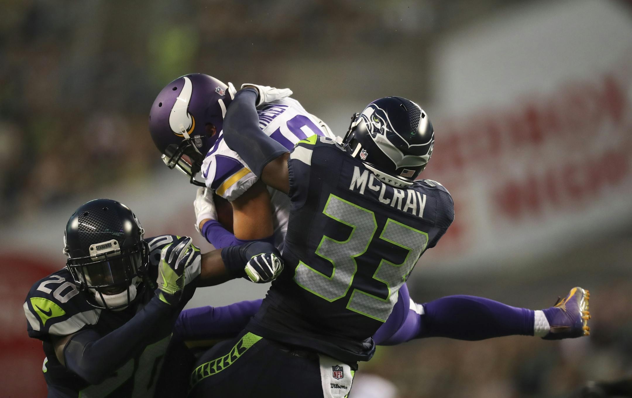 Vikings wide receiver Adam Thielen (19) with a late second quarter reception for an 18 yard gain that set up a Minnesota field goal. He was covered by Seattle Seahawks cornerback Jeremy Lane (20) and strong safety Kelcie McCray (33).