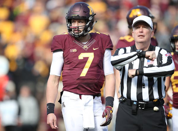 Minnesota's quarterback Mitch Leidner looked to the bench after a penalty call during the fourth quarter as Minnesota took on Iowa at TCF Bank Stadium