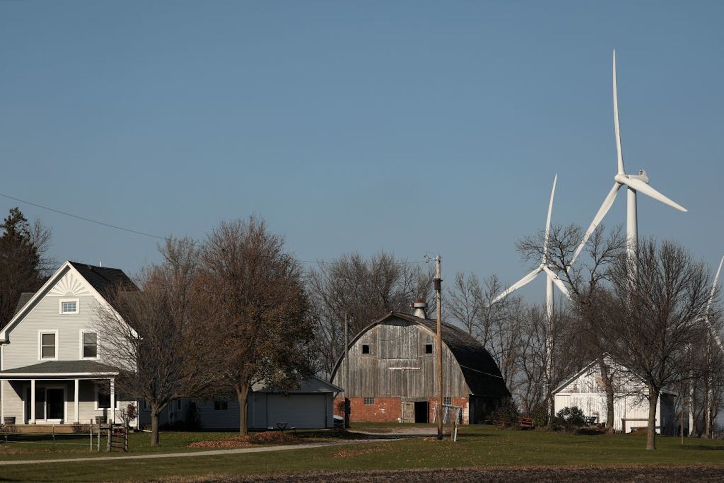 Windmills fill the landscape near Alden, Minn. Scenes like this have caused residents south of the area such as Dorenne Hansen to become more vocal in their opposition to the proposed project.