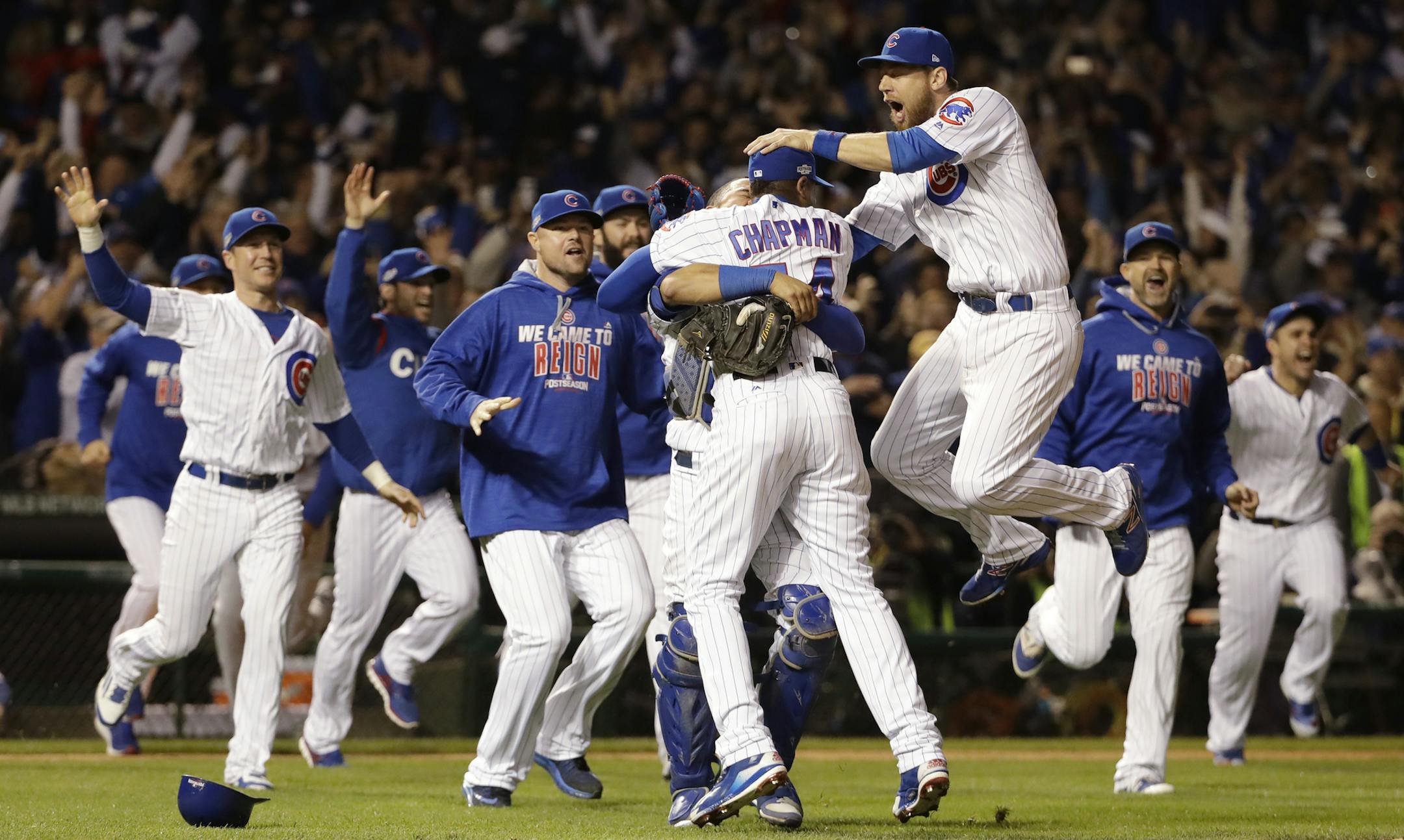 Chicago Cubs players celebrate after Game 6 of the National League baseball championship series against the Los Angeles Dodgers, Saturday, Oct. 22, 2016, in Chicago. The Cubs won 5-0 to win the series and advance to the World Series against the Cleveland Indians. (AP Photo/David J. Phillip)