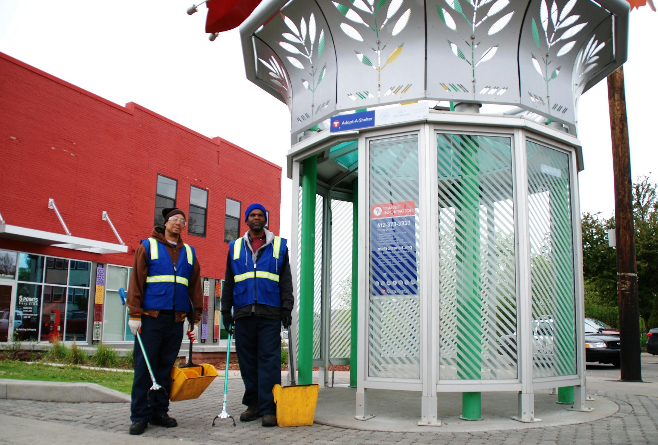 Workers pick up litter on West Broadway Avenue in north Minneapolis.