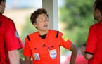 Qin Liang, FIFA referee. ] GLEN STUBBE * gstubbe@startribune.com Friday, July 10, 2015 Feature to advance the Schwan Cup youth soccer tournament on tw