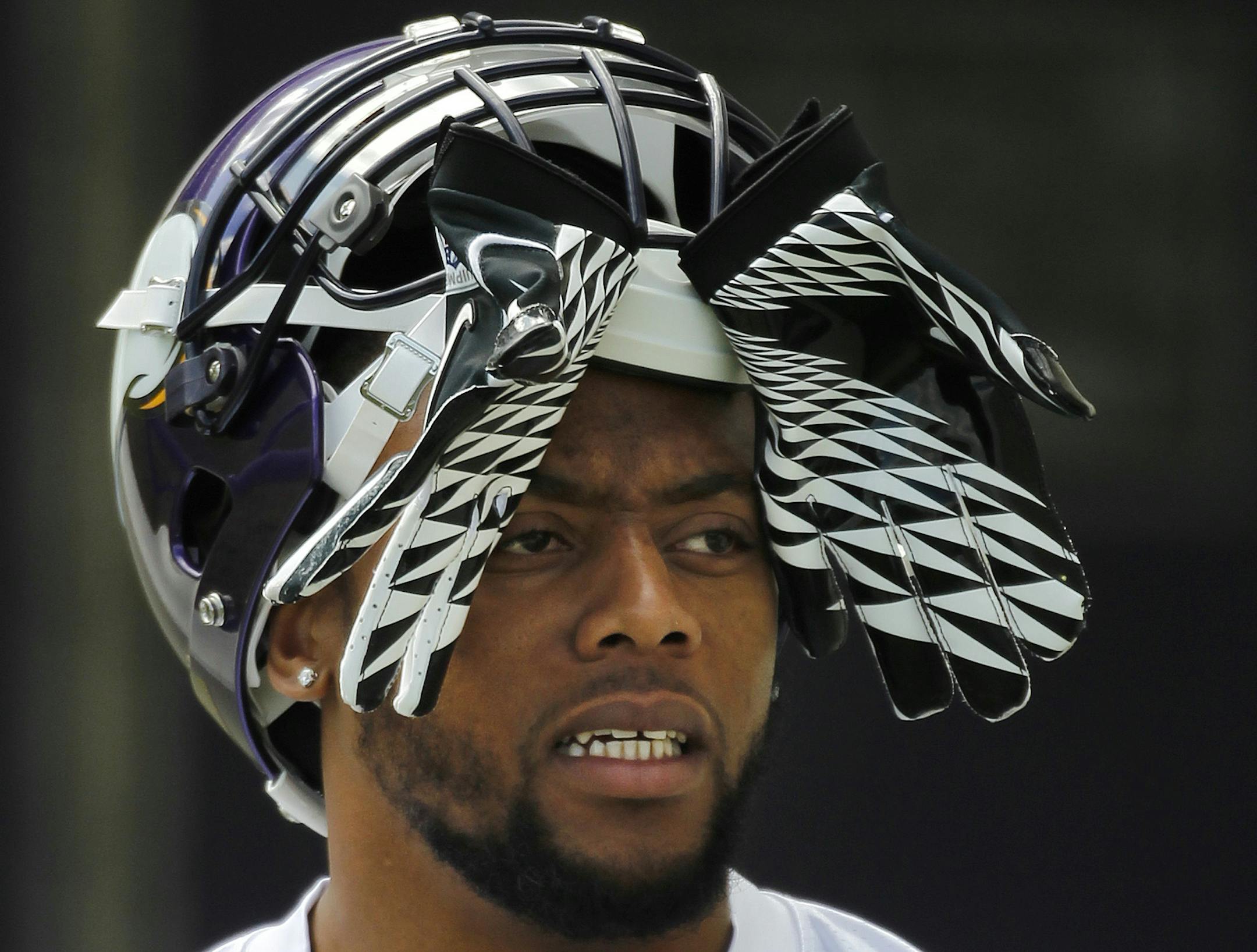 Vikings linebacker Erin Henderson walked on the practice field during Vikings organized team activities Wednesday May 30, 2012 at Winter Park in Eden Prairie, MN. (Jerry Holt/ STAR TRIBUNE/jgholt@startribune.com) ORG XMIT: MIN2013082214244131 ORG XMIT: MIN1308221426295596