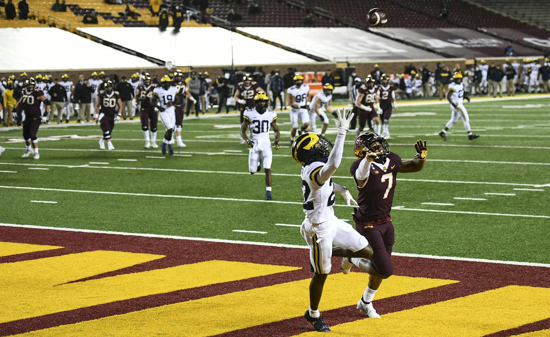 Minnesota Gophers quarterback Tanner Morgan (2) overthrew a pass to wide receiver Chris Autman-Bell (7) as he was guarded by Michigan Wolverines defensive back Gemon Green (22) in the first quarter. ] AARON LAVINSKY • aaron.lavinsky@startribune.com The Minnesota Gophers played the Michigan Wolverines on Saturday, Oct. 24, 2020 at TCF Bank Stadium in Minneapolis, Minn.