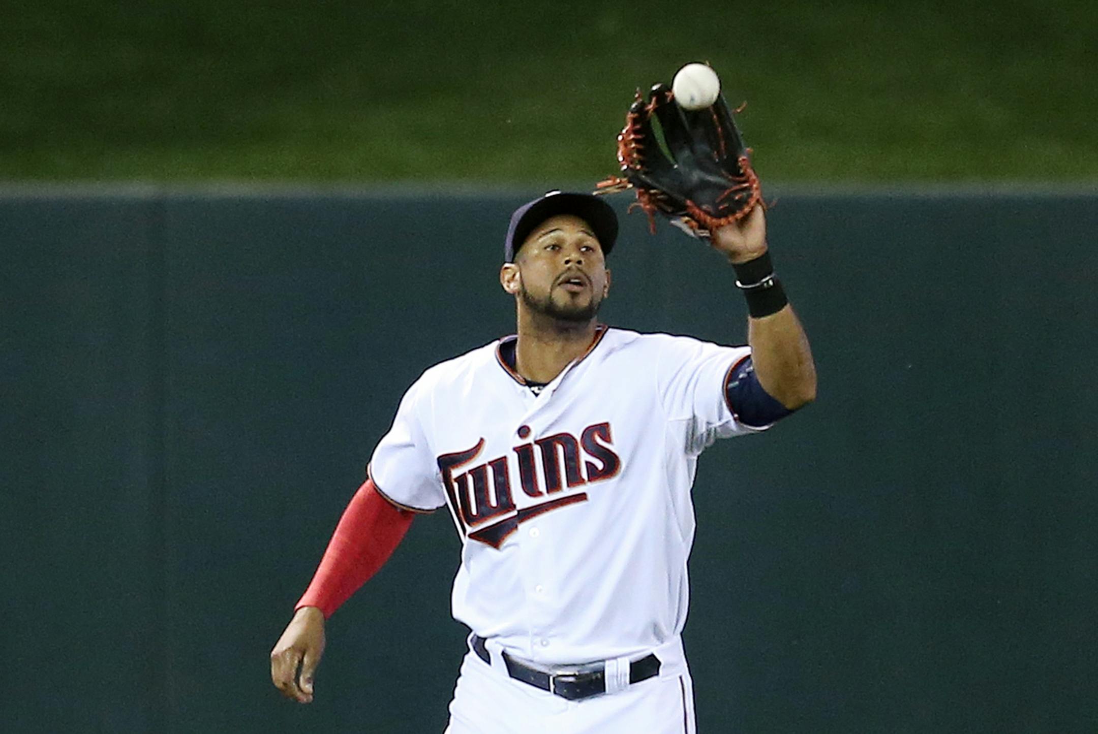 Minnesota Twins center fielder Aaron Hicks (32) caught a fly ball hit by Cleveland Indians center fielder Abraham Almonte (35) in the seventh inning at Target Field Tuesday September 22, 2015 in Minneapolis, MN.