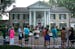 Visitors queue to enter the Graceland mansion of Elvis Presley on Aug.12, 2017, in Memphis.