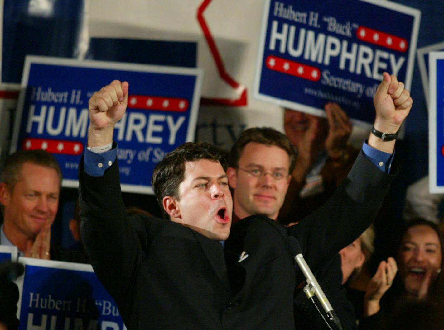 November 5, 2002. St. Paul, MN. Election eve results at the DFL campaign at the Radisson Riverfront. Hubert "Buck" Humphrey shows his happiness as on the podium, as it looked like he was winning the Secretary of State race.