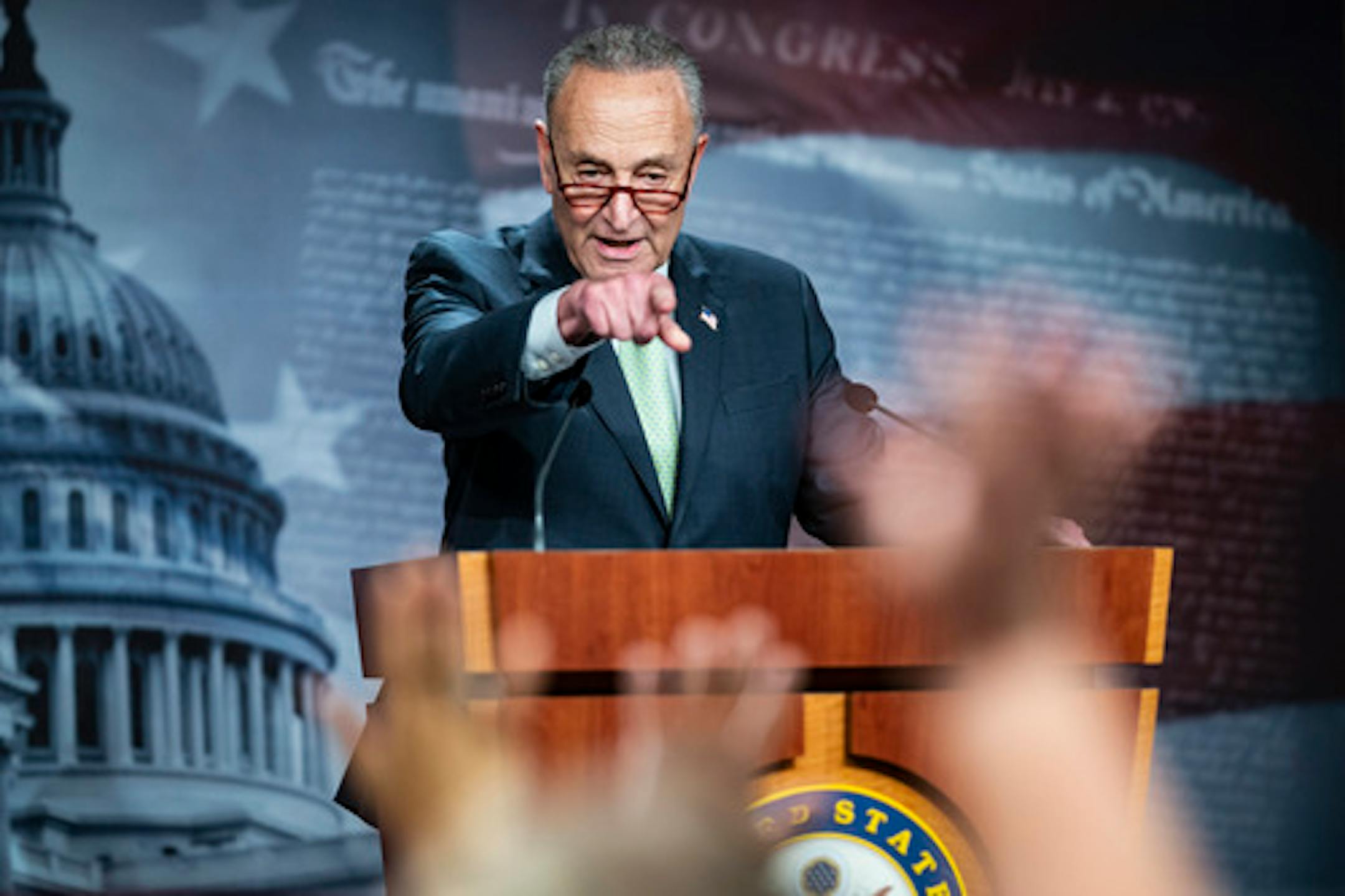 Senate Majority Leader Chuck Schumer, D-N.Y., speaks about his deal with Sen. Joe Manchin, D-W.Va., at a news conference Thursday on Capitol Hill. MUST CREDIT: Washington Post photo by Jabin Botsford.
