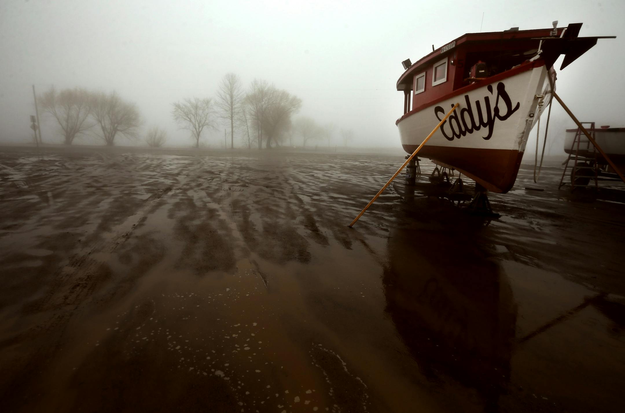 The launch boats at Eddy's Resort in Onamia, MN are still parked on the shore because the ice is still on the lake Thursday morning.Thick ice is still on Lake Millie Lacs just days before the Minnesota fishing opening as resort owner prepare for the season Thursday May 9, 2013 on the shores of Lake Millie Lacs , MN. ] JERRY HOLT ‚Ä¢ jerry.holt@startribune.com