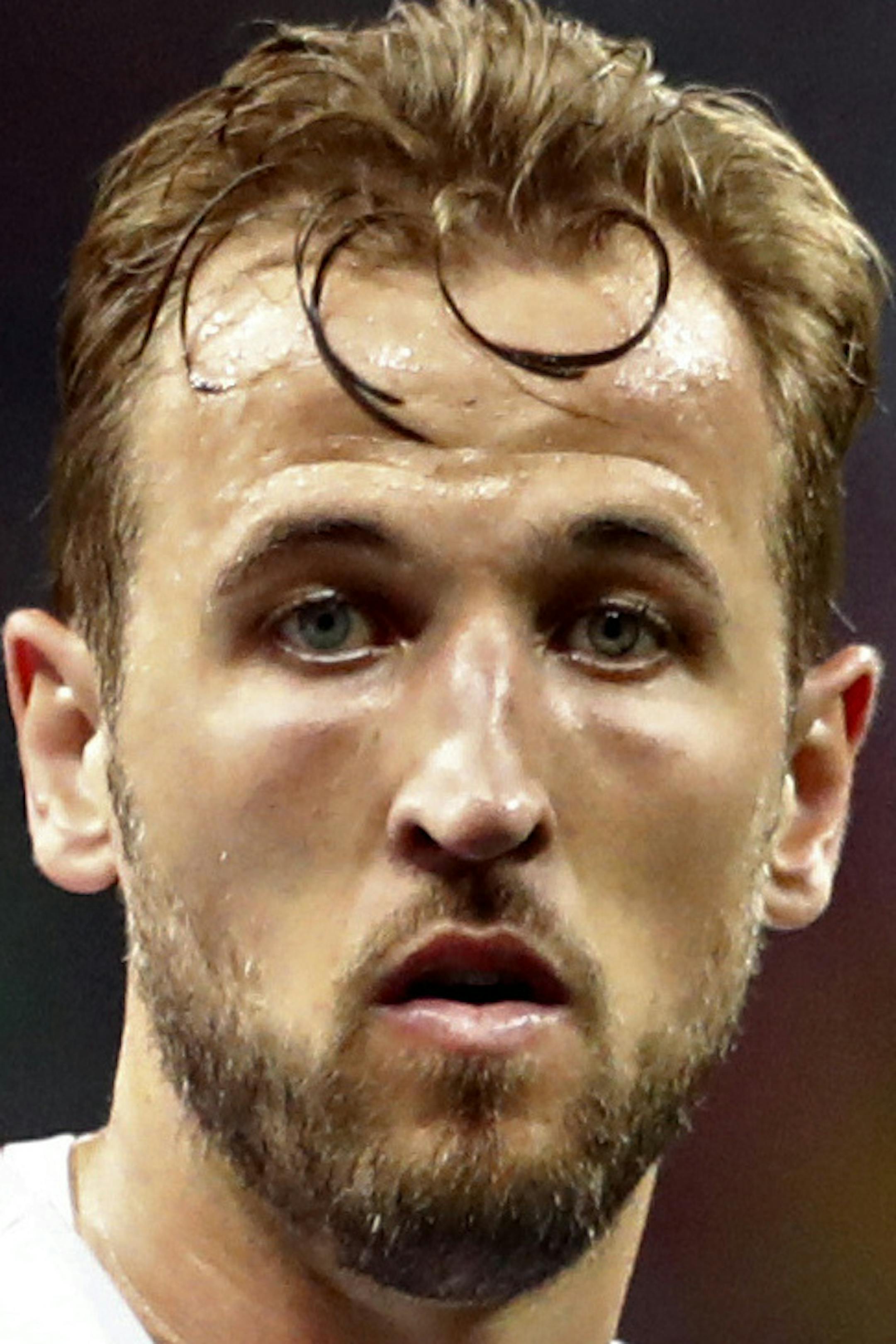 England's Harry Kane points up during the semifinal match between Croatia and England at the 2018 soccer World Cup in the Luzhniki Stadium in Moscow, Russia, Wednesday, July 11, 2018. (AP Photo/Matthias Schrader)