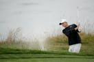 Aaron Wise hits out of a bunker on the fifth hole during the third round of the U.S. Open Championship golf tournament Saturday, June 15, 2019, in Peb