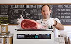 Butcher Frederick C. Kaufmann weighs a ribeye at Proper Sausages in Miami Shores, Fla., on June 27, 2018. (Carl Juste/Miami Herald/TNS) ORG XMIT: 1234