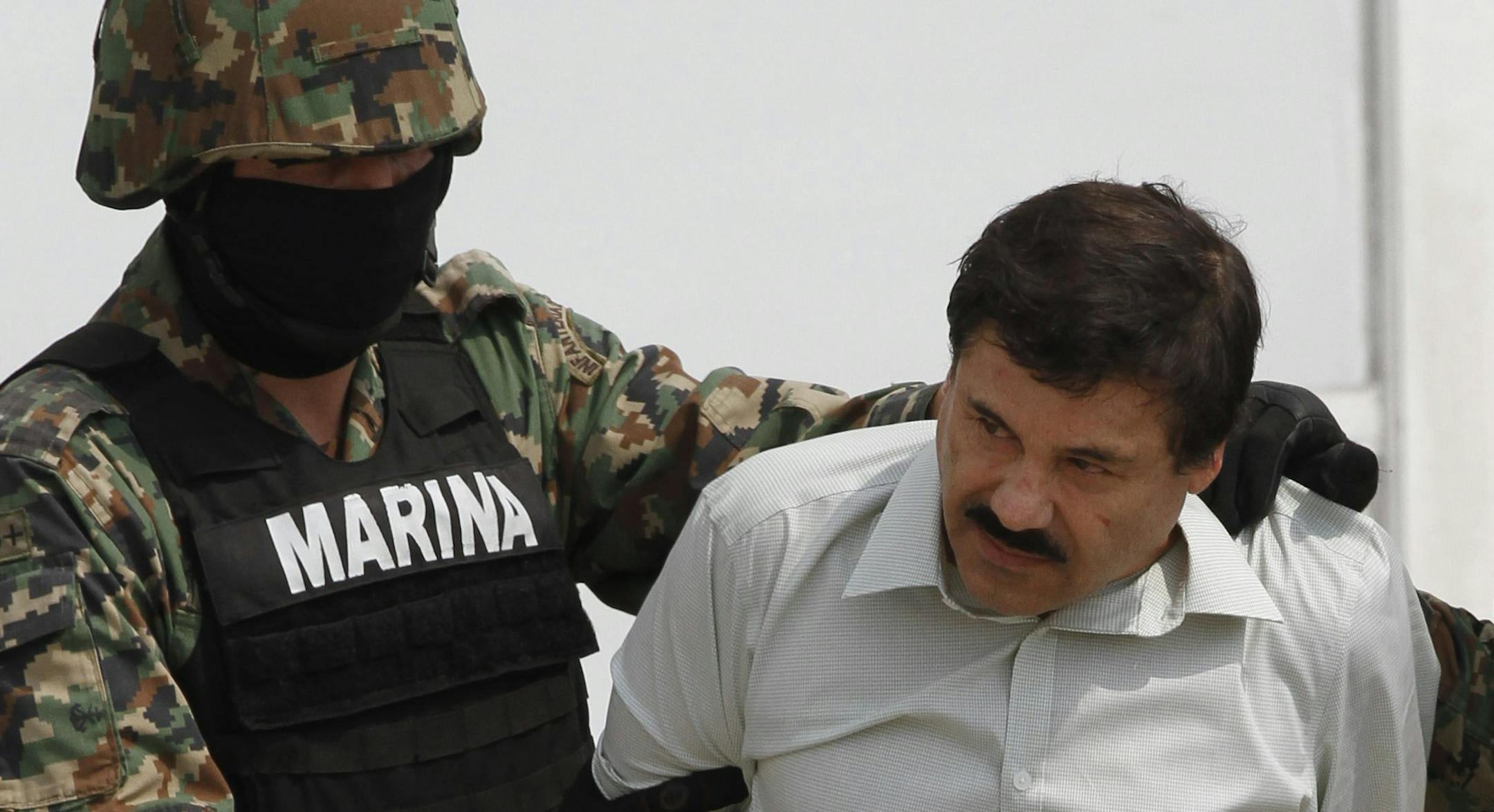 In 2014, Joaquin "El Chapo" Guzman was escorted to a helicopter in handcuffs by Mexican navy marines.