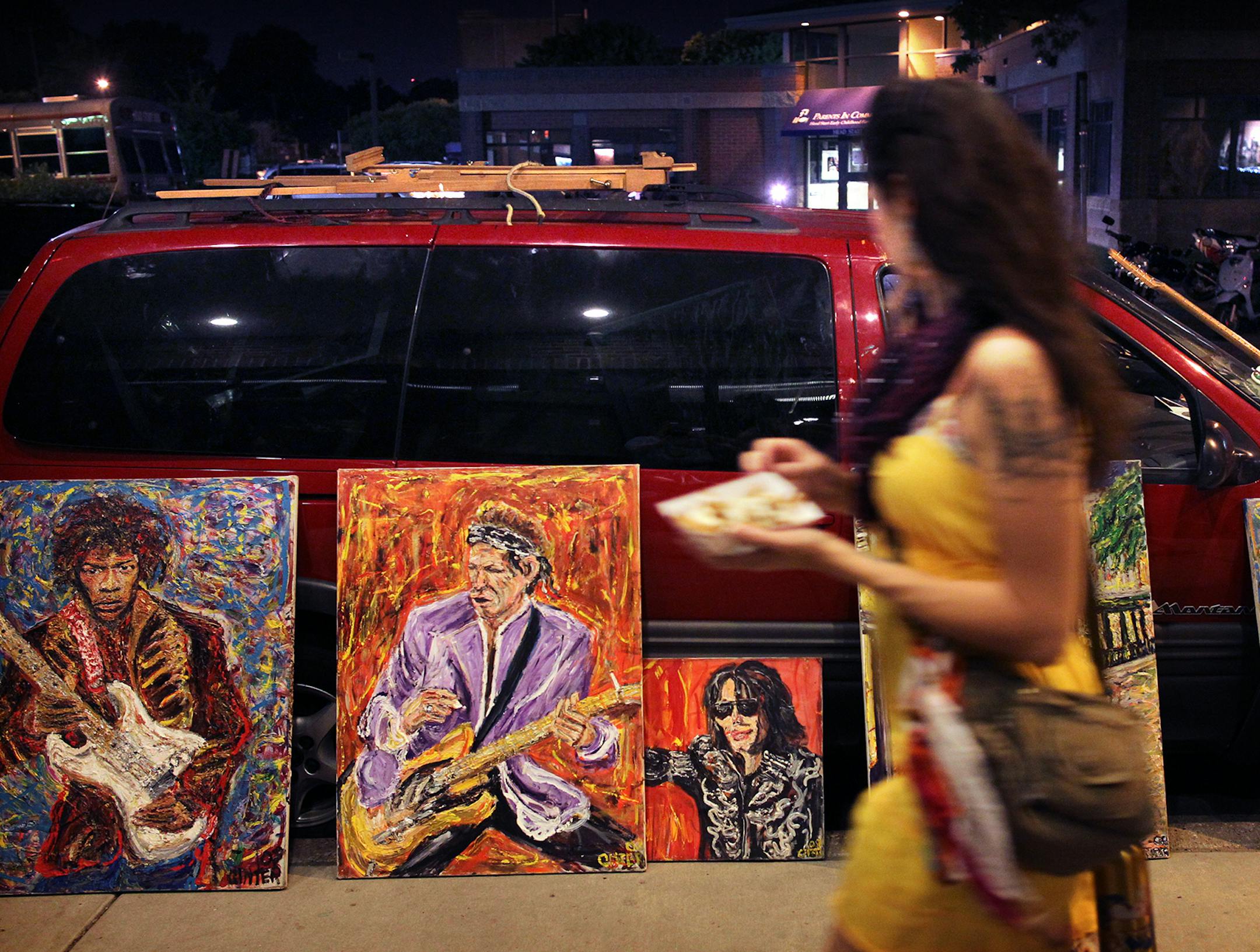 Artist, Patrick Ginter Showed his artwork on 13th Ave North East. Art-A-Whirl, takes place annually in Northeast Minneapolis, the third weekend of May. This event is free and open to the public. [ TOM WALLACE ‚Ä∞√õ¬¢ twallace@startribune.com _ Assignments #20023600A_ May 15, 2012_ SLUG: artawhirl0519_ EXTRA INFORMATION ORG XMIT: MIN2014051915035447