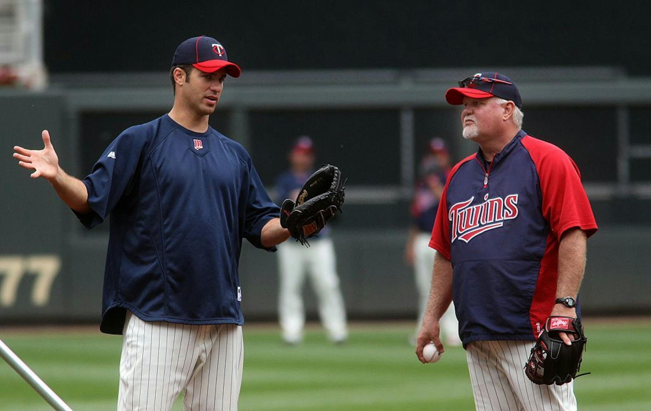 Mauer and manager Ron Gardenhire visited at second base during pre-game warm ups.