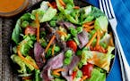 Credit: Meredith Deeds, Special to the Star Tribune Asian Steak Salad with Peanut Curry Dressing