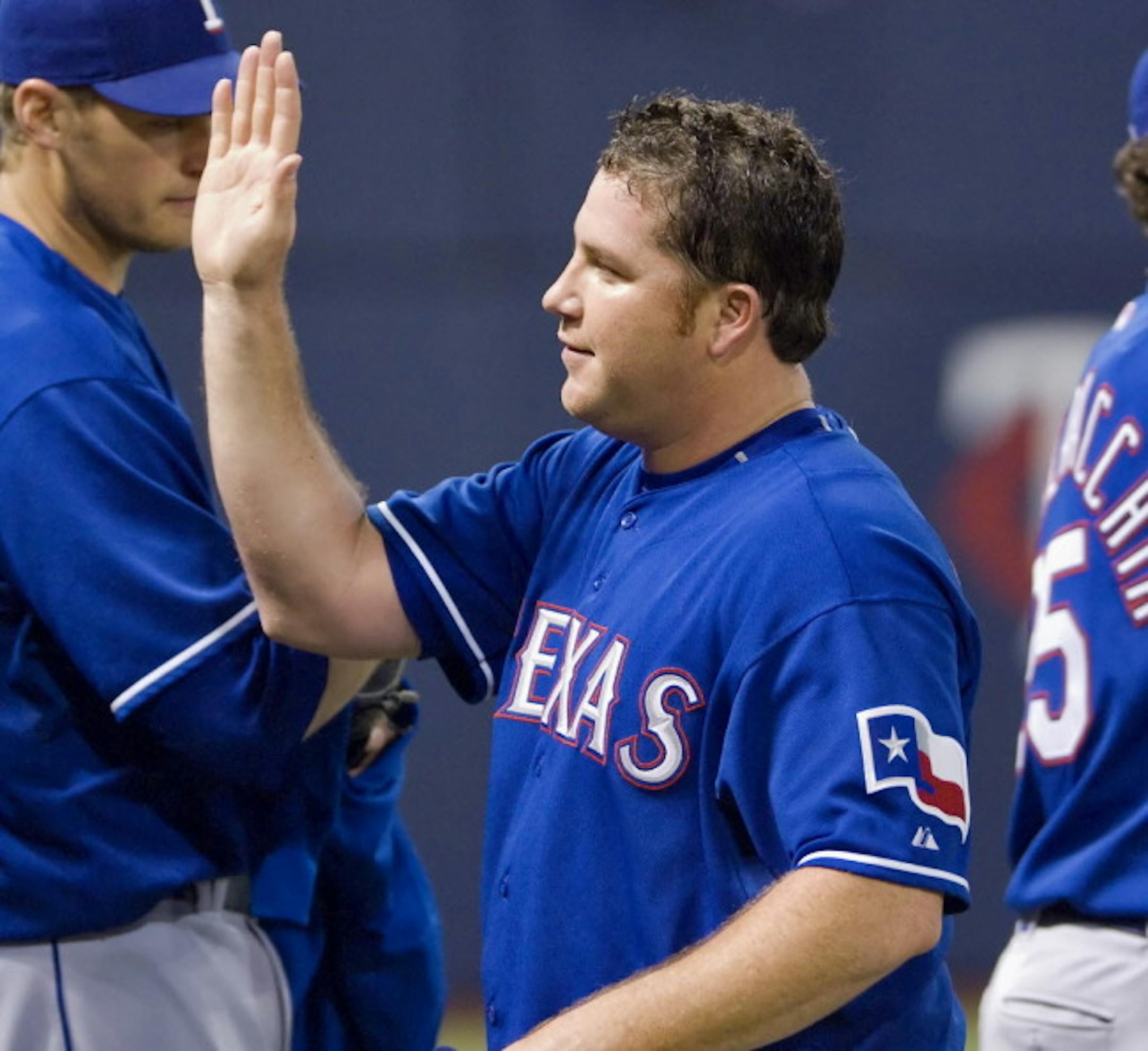 Pitcher Sidney Ponson celebrated the Ranger victory following the game.