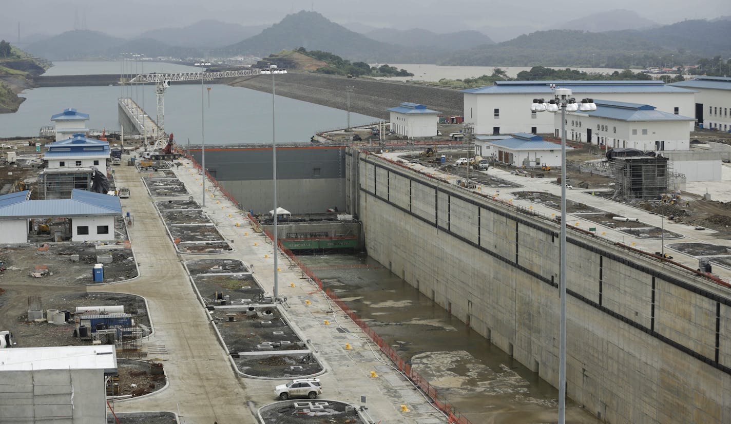 A view where a set of new locks were installed, seen during a press tour of the Panama Canal expansion project, in Cocoli, near Panama City, Tuesday, Nov. 17, 2015. The third set of locks will allow the passage of Post-Panamax vessels or container ships much too big to fit through the older locks. (AP Photo/Arnulfo Franco) ORG XMIT: NYOTK