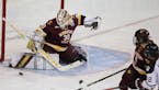 Minnesota Duluth goalie Emma Soderberg turned aside a shot for one of her 44 save against Northeastern in the NCAA Frozen Four semifinals.