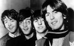 Shown is the famous music group the Beatles in 1968. From left to right the "Fab Four" are Paul McCartney, John Lennon, Ringo Starr, and George Harris