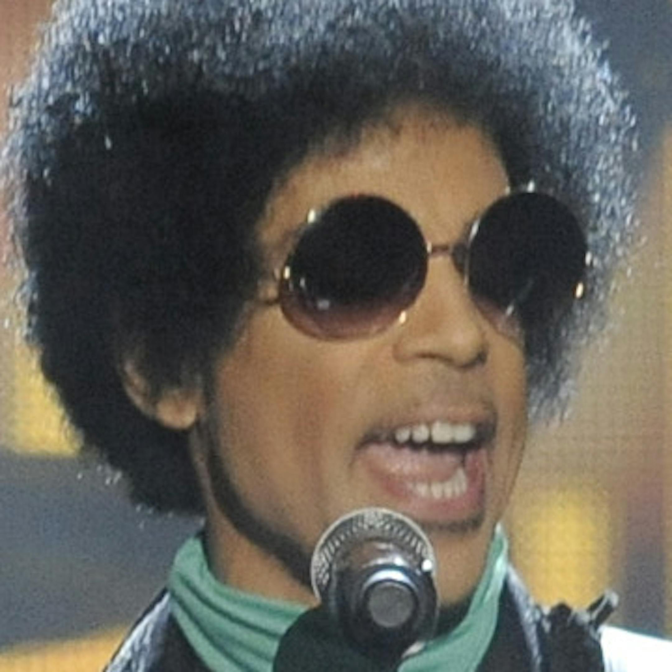 Prince performs at the Billboard Music Awards at the MGM Grand Garden Arena on Sunday, May 19, 2013 in Las Vegas. (Photo by Chris Pizzello/Invision/AP) ORG XMIT: MIN2013052917194842