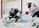 Wild goalie Alex Stalock, who came in when Devan Dubnyk was injured, made a save in the second period against the Oilers on Tuesday night, a 3-0 Wild 