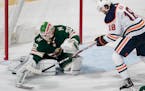 Wild goalie Alex Stalock, who came in when Devan Dubnyk was injured, made a save in the second period against the Oilers on Tuesday night, a 3-0 Wild 