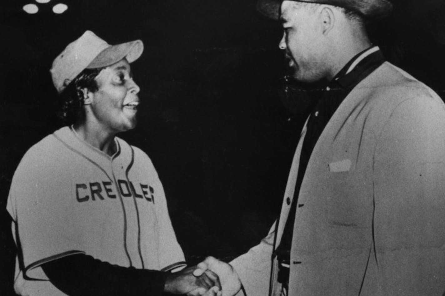 Toni Stone met boxing great Joe Louis in 1949.