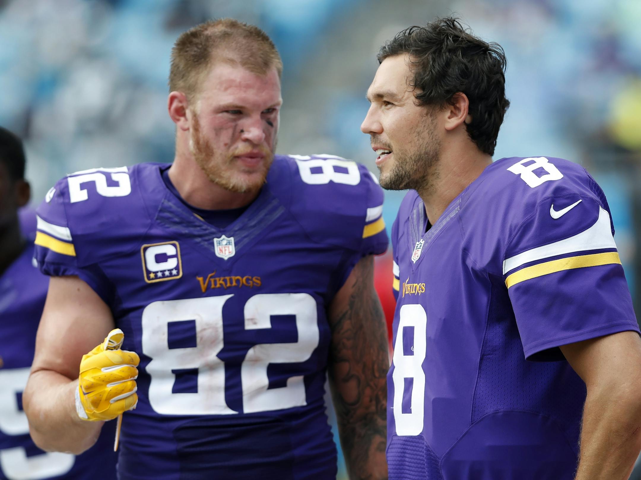 Minnesota Vikings Kyle Rudolph (82) and Sam Bradford (8).