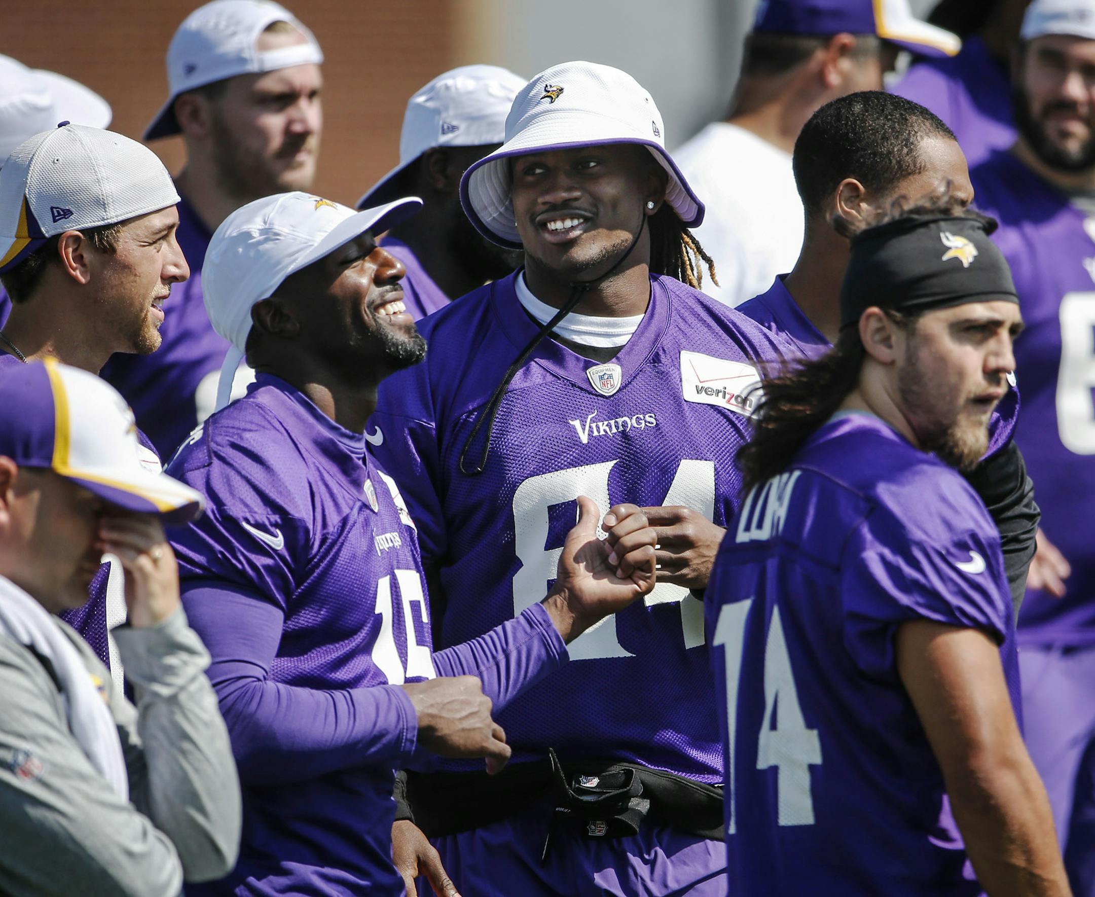 Minnesota Vikings receivers Greg Jennings (15) and Cordarrelle Patterson (84) appear happy to be back at training camp Friday, July 25, 2014, at Mankato State University in Mankato, MN.] (DAVID JOLES/STARTRIBUNE) djoles@startribune Minnesota Vikings training camp Friday, July 24, 2014, in Mankato, MN.