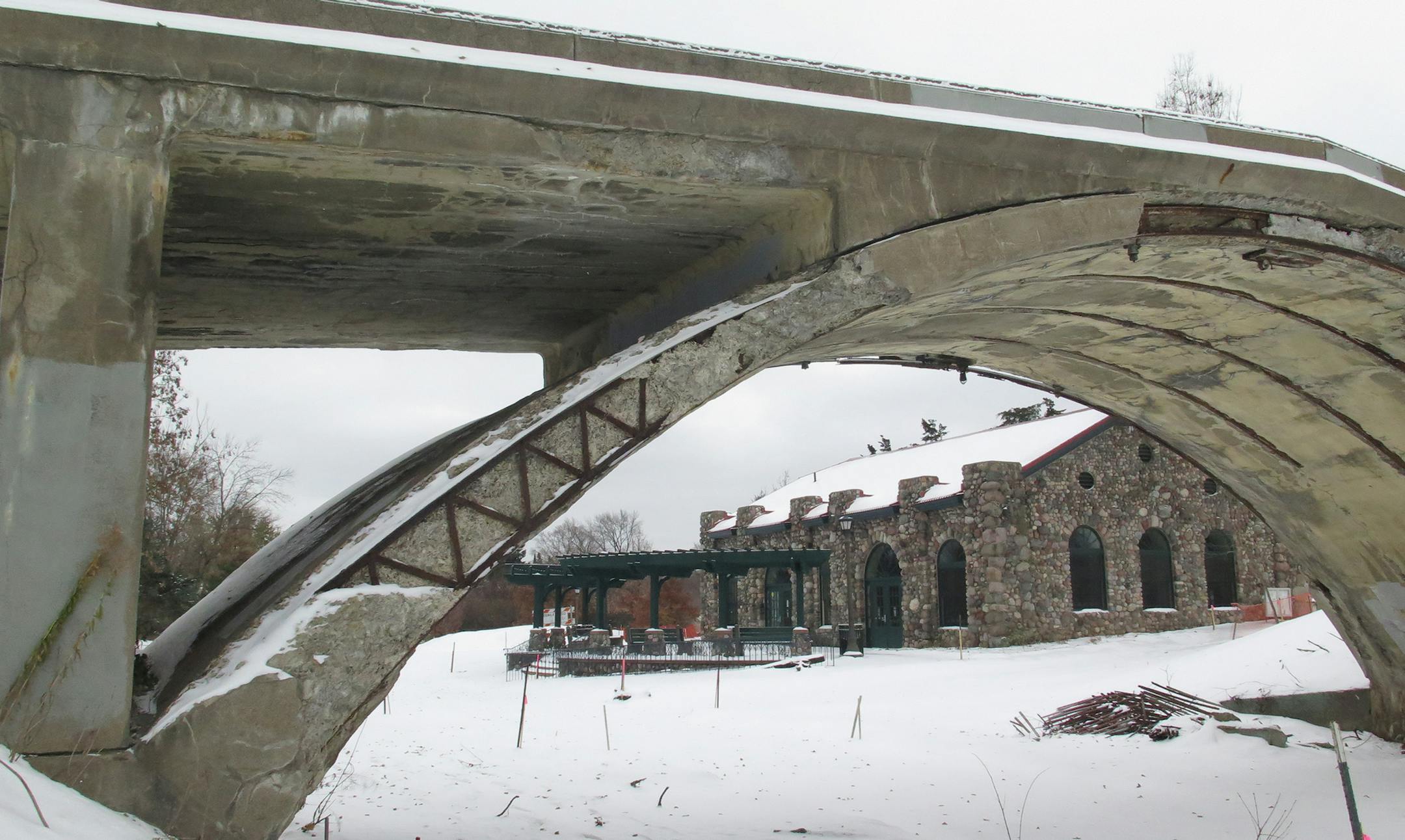 Long-planned renovation of the historic Como Park Pedestrian Bridge, which is finally happening after a long effort to secure funding for it. It has been closed to pedestrians for a long time because of its dangerous, crumbling condition, and was in danger of being torn down. It was built in 1904 as a bridge over the streetcar tracks that brought visitors into the park ] Tom Sweeney 11/12/2014 St. Paul, MN