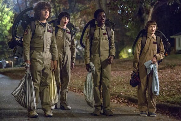 This image released by Netflix shows Gaten Matarazzo, from left, Finn Wolfhard, Caleb McLaughlin and Noah Schnapp in a scene from "Stranger Things," p