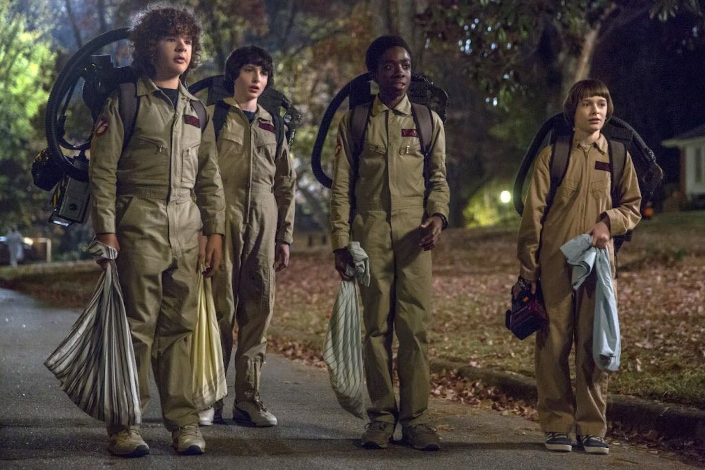 This image released by Netflix shows Gaten Matarazzo, from left, Finn Wolfhard, Caleb McLaughlin and Noah Schnapp in a scene from "Stranger Things," premiering its second season on Friday.