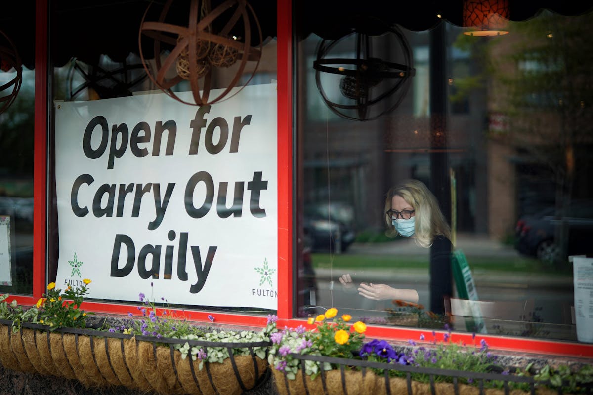Restaurants had to go back to take-out mode under Minnesota's latest restrictions to stop the spread of the coronavirus. (GLEN STUBBE, Star Tribune)