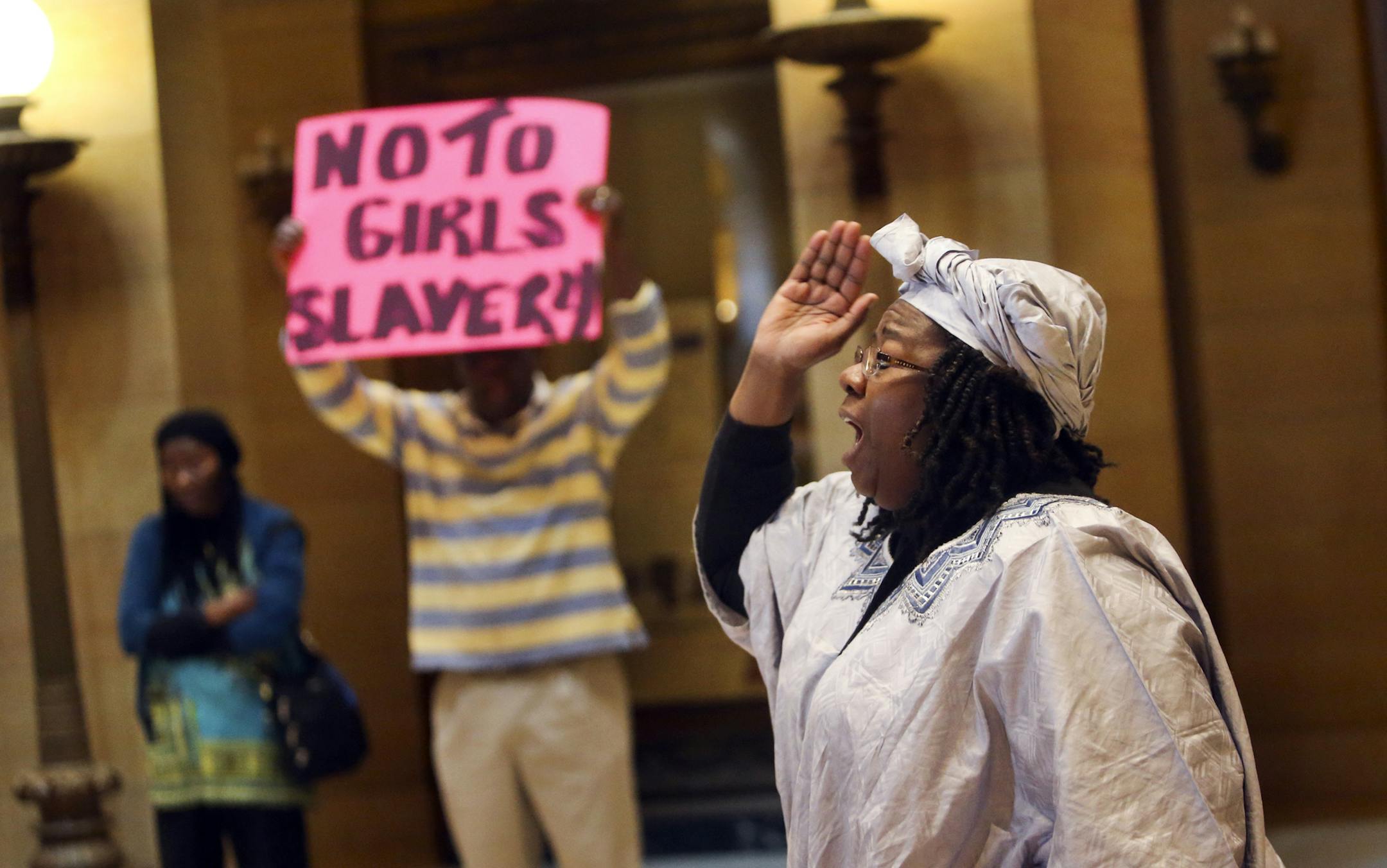 Bravada Garrett-Akinsanya, a child pyschologist from Plymouth, was among those speaking out with outrage during a protest against the abduction of more than 250 young Nigerian girls from a school by the terrorist group Boko Harem Friday, May 9, 2014, at the State Capitol in St. Paul, MN.](DAVID JOLES/STARTRIBUNE) djoles@startribune Galvanize and embrace international condemnation of continuous ABDUCTION of our young innocent Nigerian girls by terrorist group -- Boko Harem and what our own Sr. US
