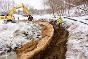 Workers installed "soil burritos'' to restore Minnehaha Creek's natural curves in St. Louis Park, part of a project to improve water quality and renew