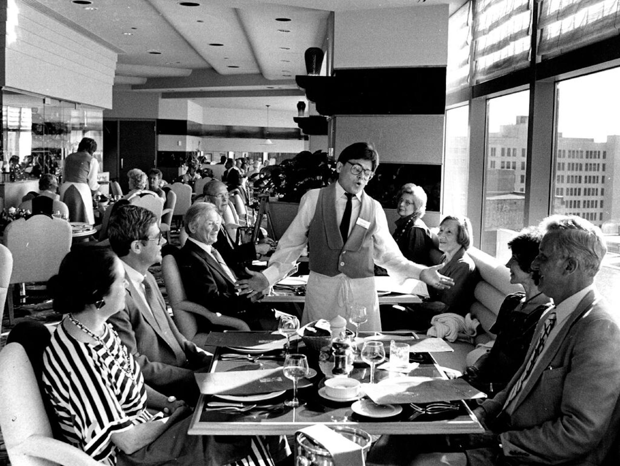 July 13, 1984 Dining out Bravo Gustino's The dinner only Italian restaurant in the Amfac Hotel, 30 S. 7th St. (349-4000), offers views of the city at sunset, plus food, music and charm. The staff - part-timers with the Minnesota Opera and other theater and music companies - periodically stops pushing the pasta around the room to let fly with cascades of tunes by Rossini, Puccini, Verdi, Sondheim. In between oeuvres, the ivory piano pours forth Beethoven, Chopin and the like. Grilled salmon with
